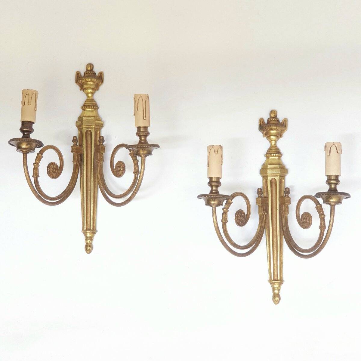 Pair of bronze wall sconces in Louis XVI style