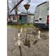 Vintage gold metal chandelier with floral decoration.
