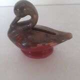 Old piggy bank to break in the shape of a swan