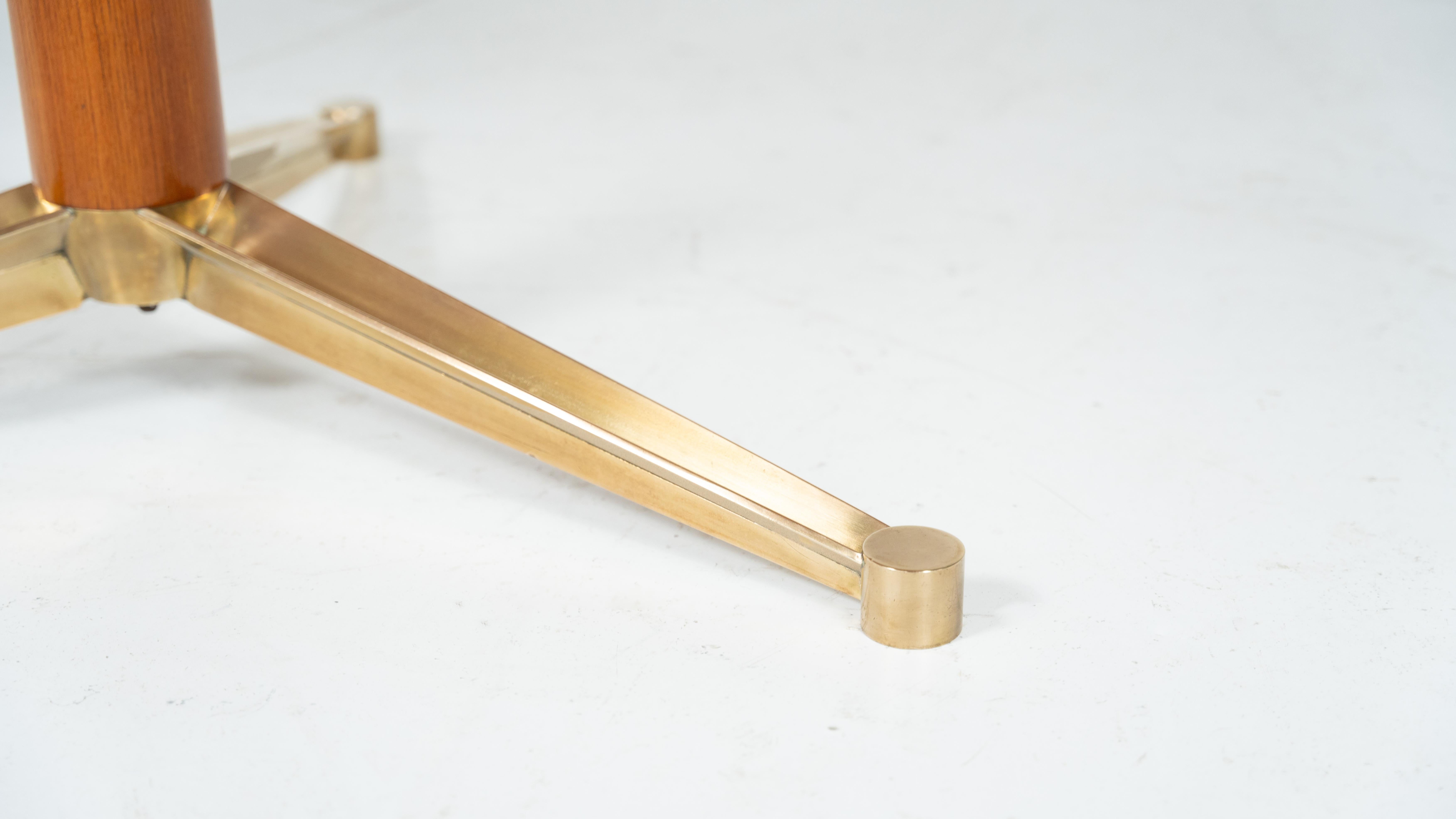 Dining table by Melchiorre Bega, brass and wood, Italy, 1950s.