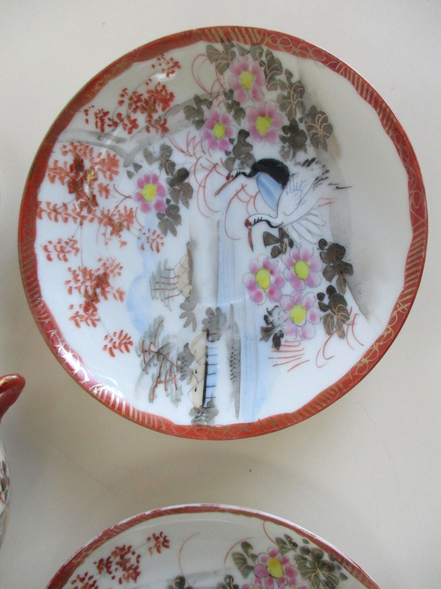 Antique cups and under cups porcelain japan