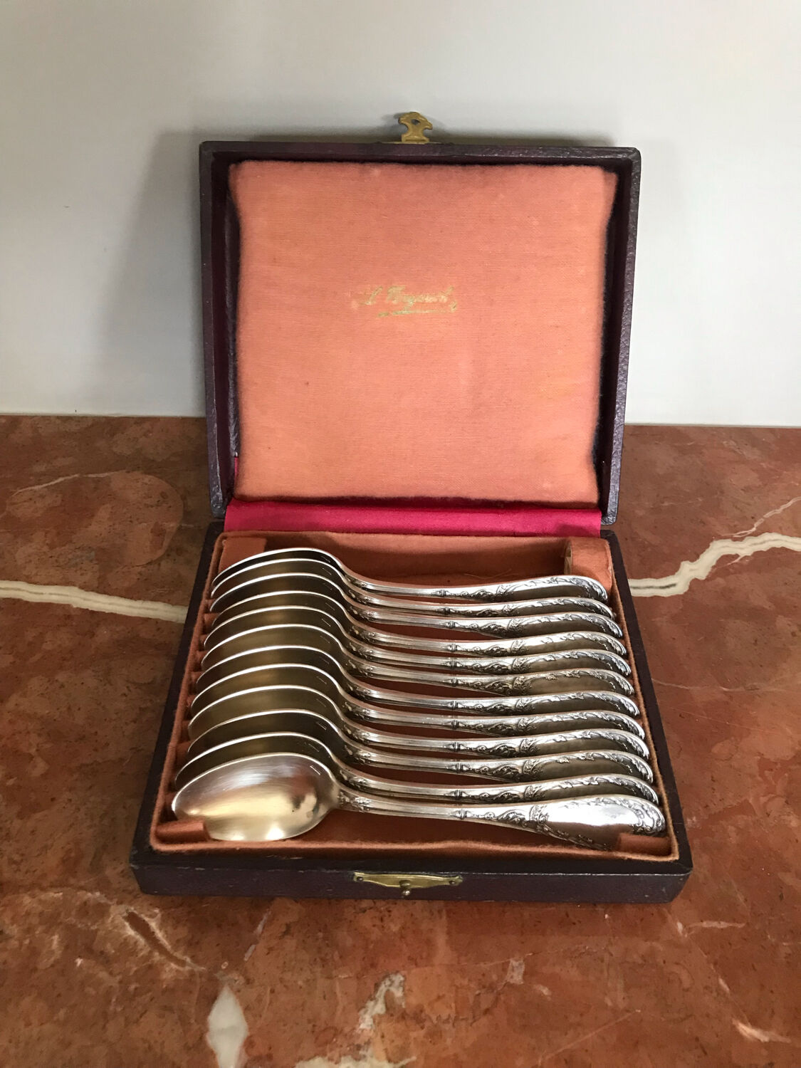 Series of 12 small silver metal spoons