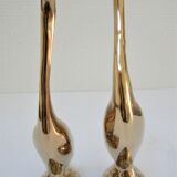 Pair of stylized birds in solid brass