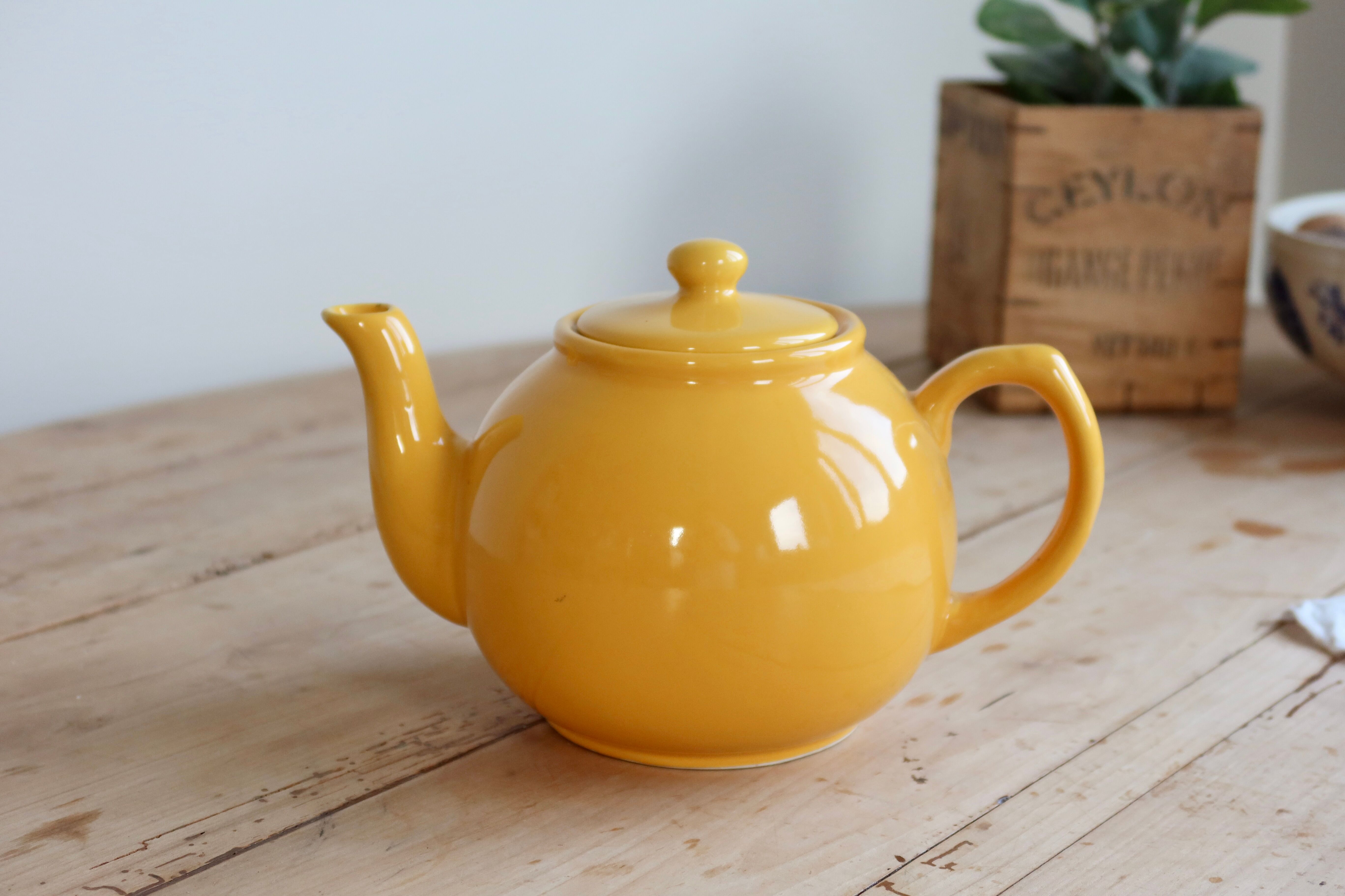 Vintage bright yellow ceramic teapot