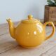 Vintage bright yellow ceramic teapot
