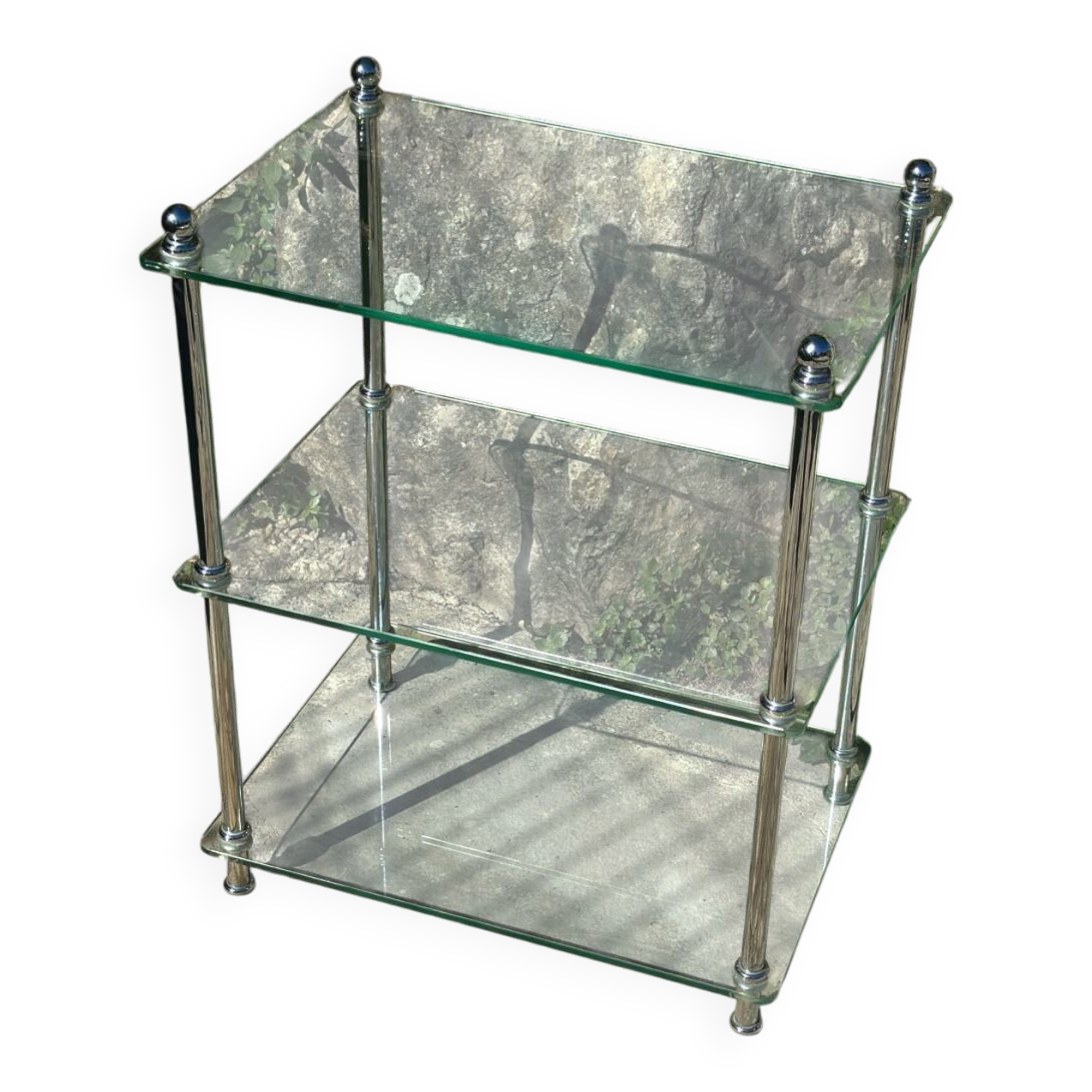 Petite étagère en verre et chrome .