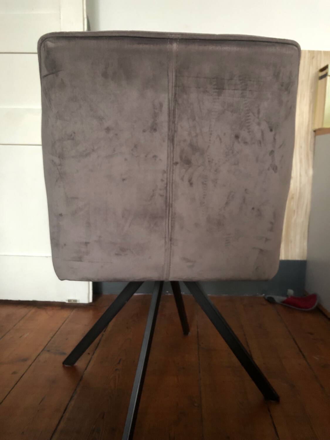 Grey fabric swivel chair in industrial style