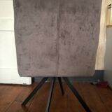 Grey fabric swivel chair in industrial style