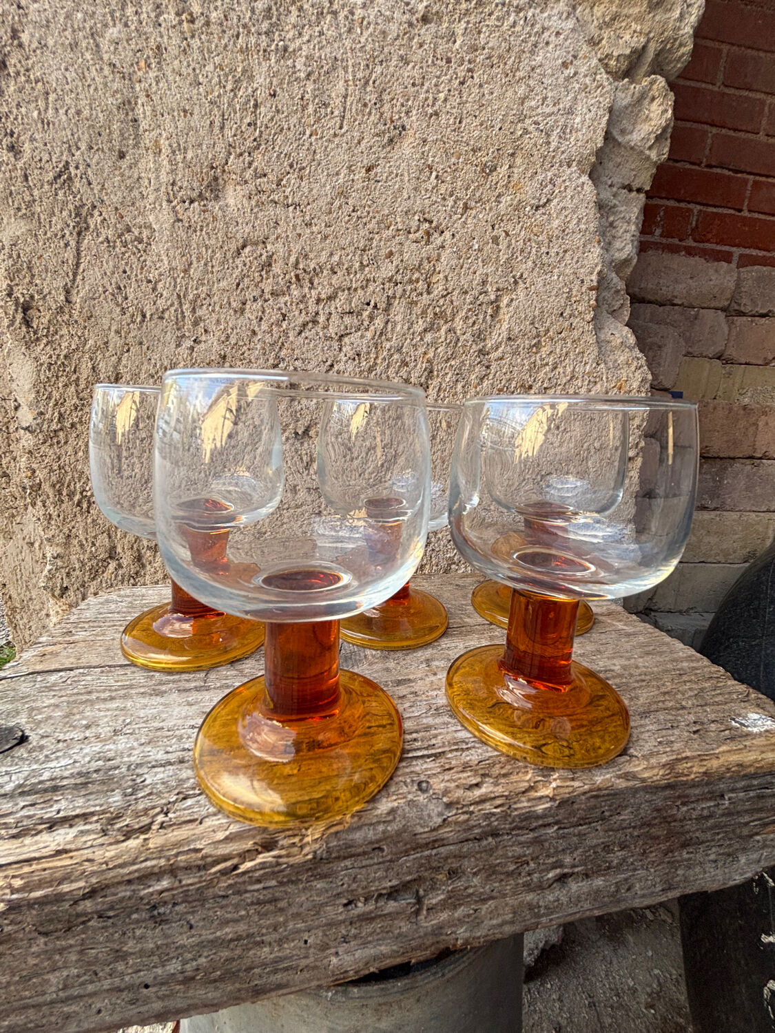 Luminarc footed glasses from the 1970s in orange.