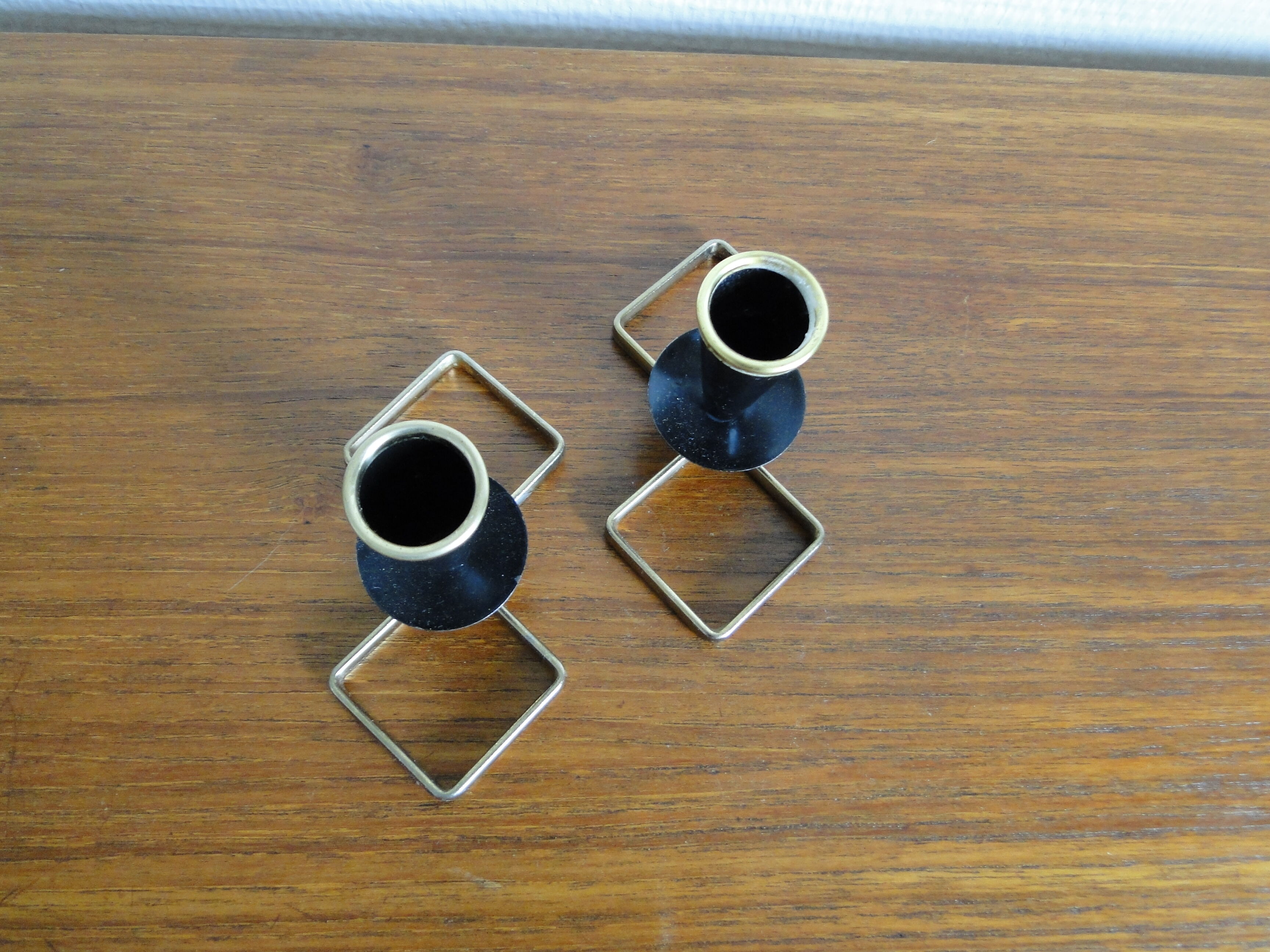 Pair of vintage candle holders in black metal and brass Sweden 1960