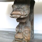 Gothic bench made of solid wood, heads of carved grotesques
