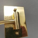 Danish Brass wall lamp with a ‘swivel’ effect.