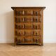 Antique solid wood chest of drawers with five drawers.