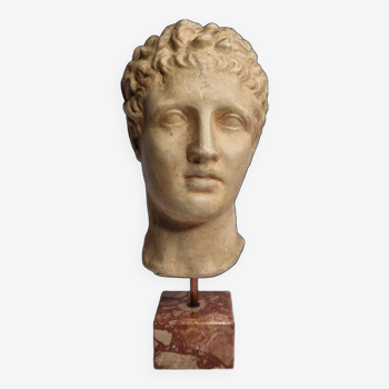 Bust of Hermes in patinated plaster on brown marble base, 34 cm