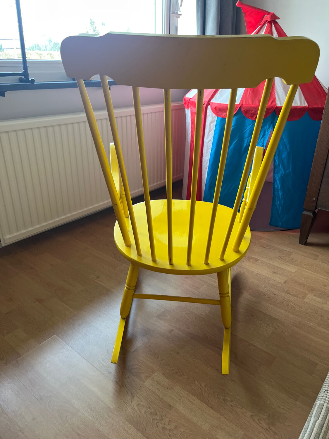Vintage yellow rocking chair