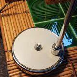 Chrome metal desk lamp and gray articulated arm