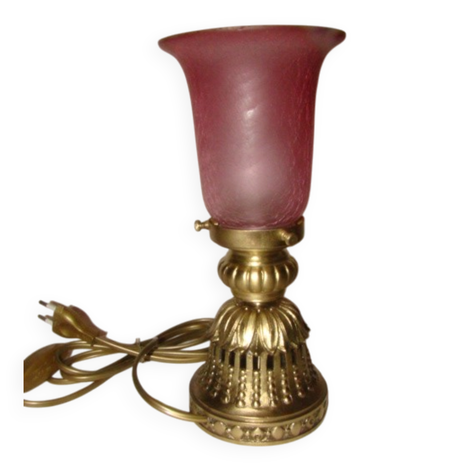 bronze bedside lamp with a pink cracked glass shade
