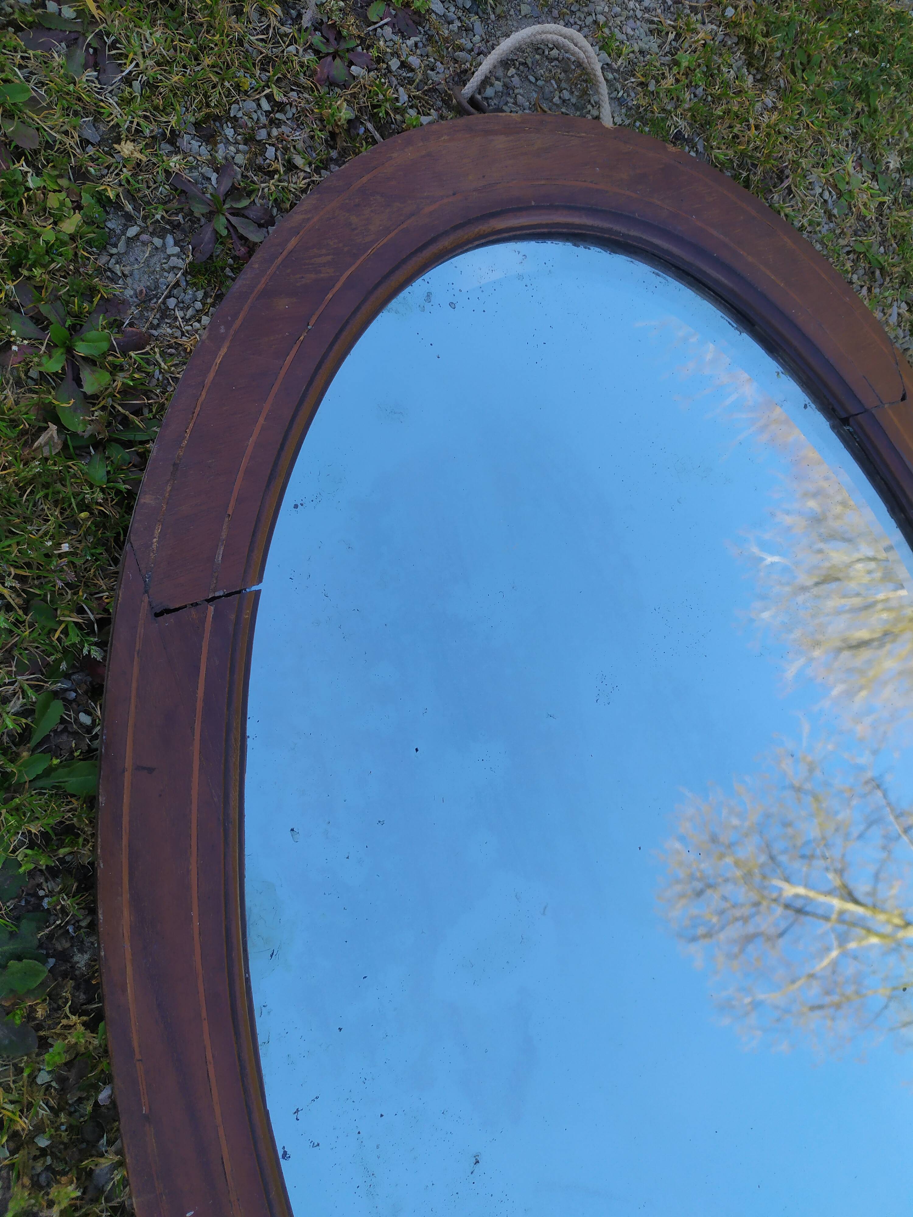 Beveled oval mirror 83x52cm