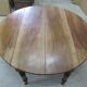 Round table 4 feet, opening with walnut shutters