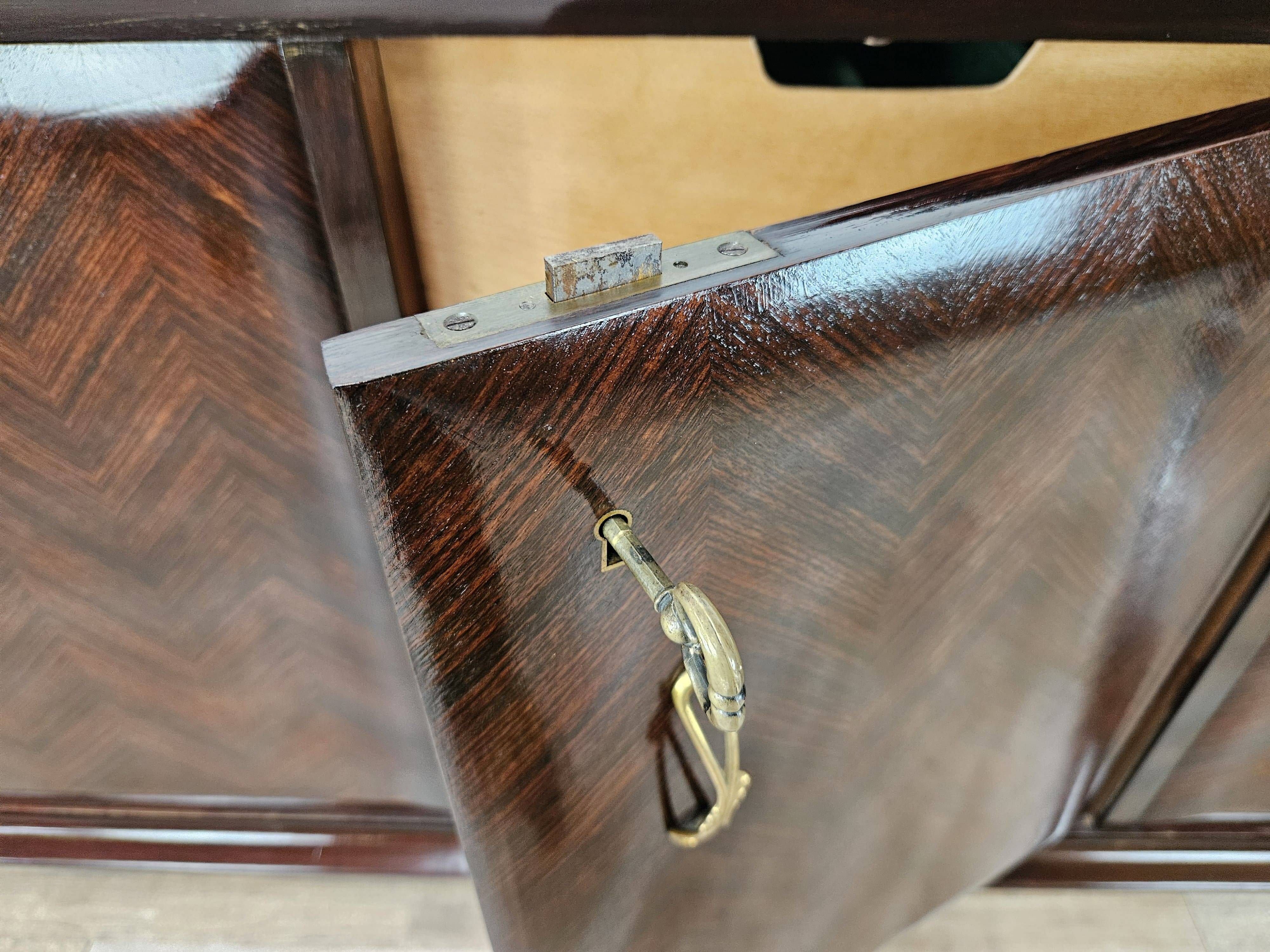 Mahogany sideboard with a glass top, 1960