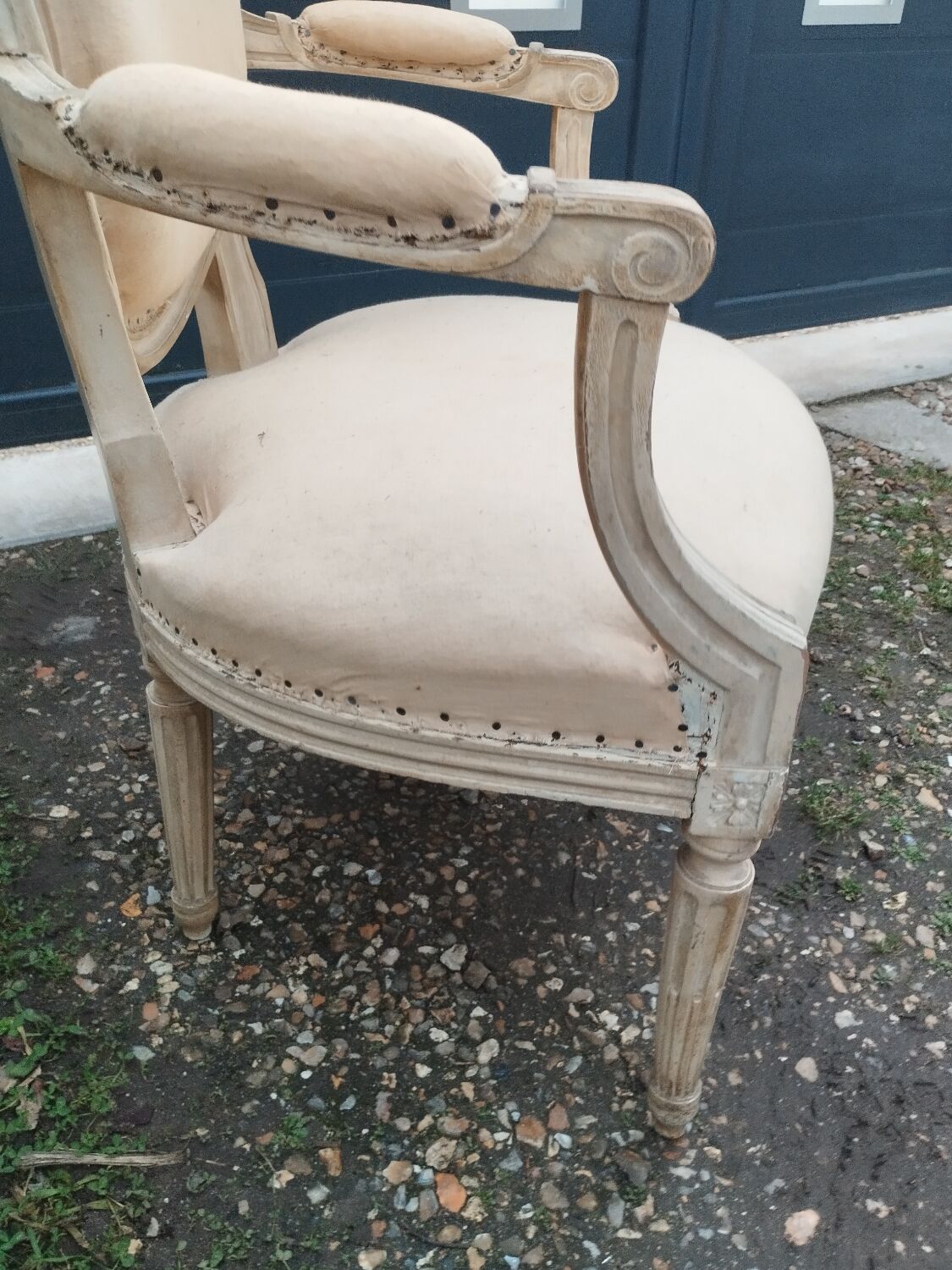 Antique armchair in Louis XVI style from the late 19th century.