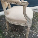 Antique armchair in Louis XVI style from the late 19th century.