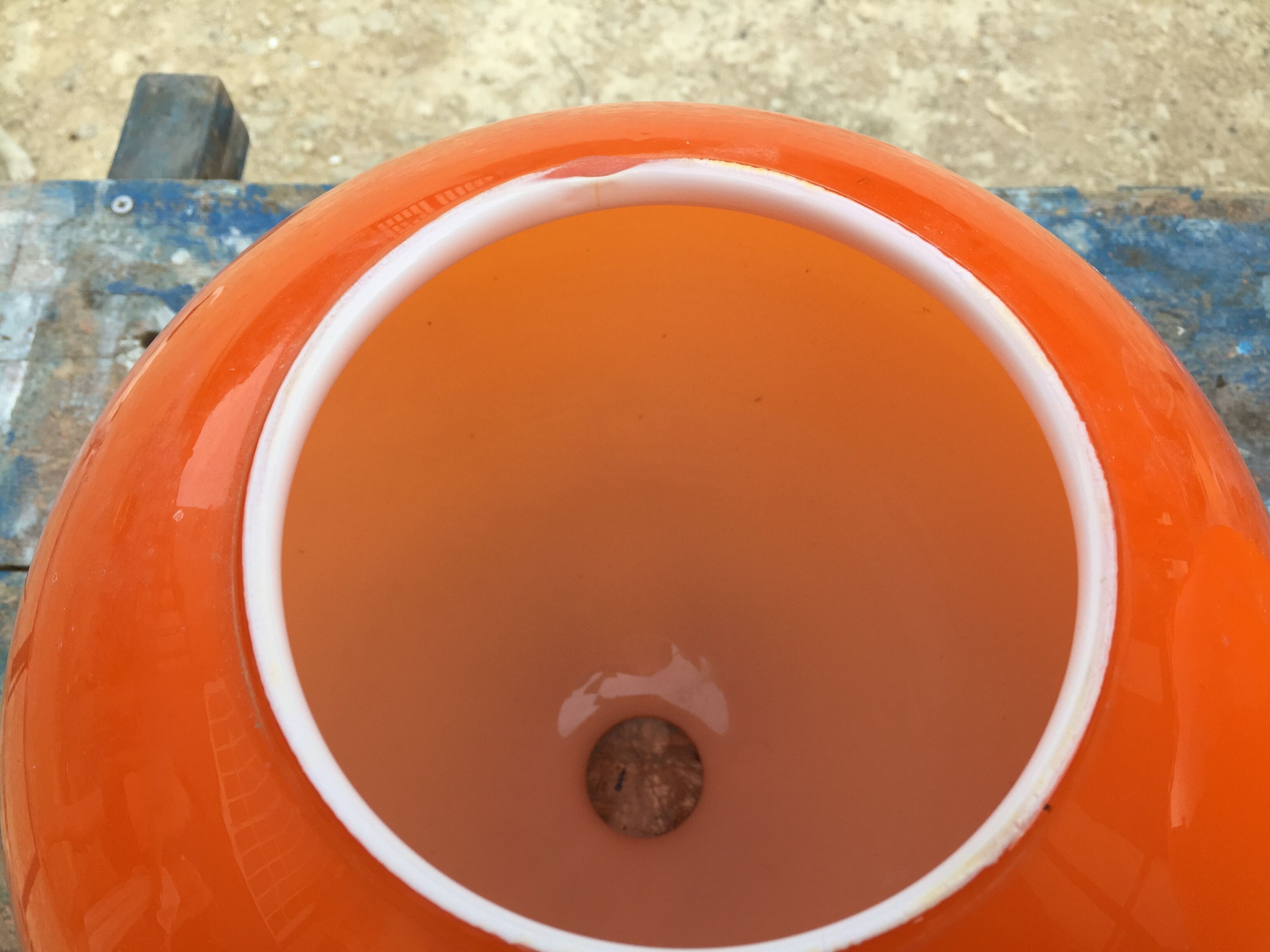 Two orange opaline globes, 30 cm diameter