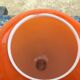 Two orange opaline globes, 30 cm diameter