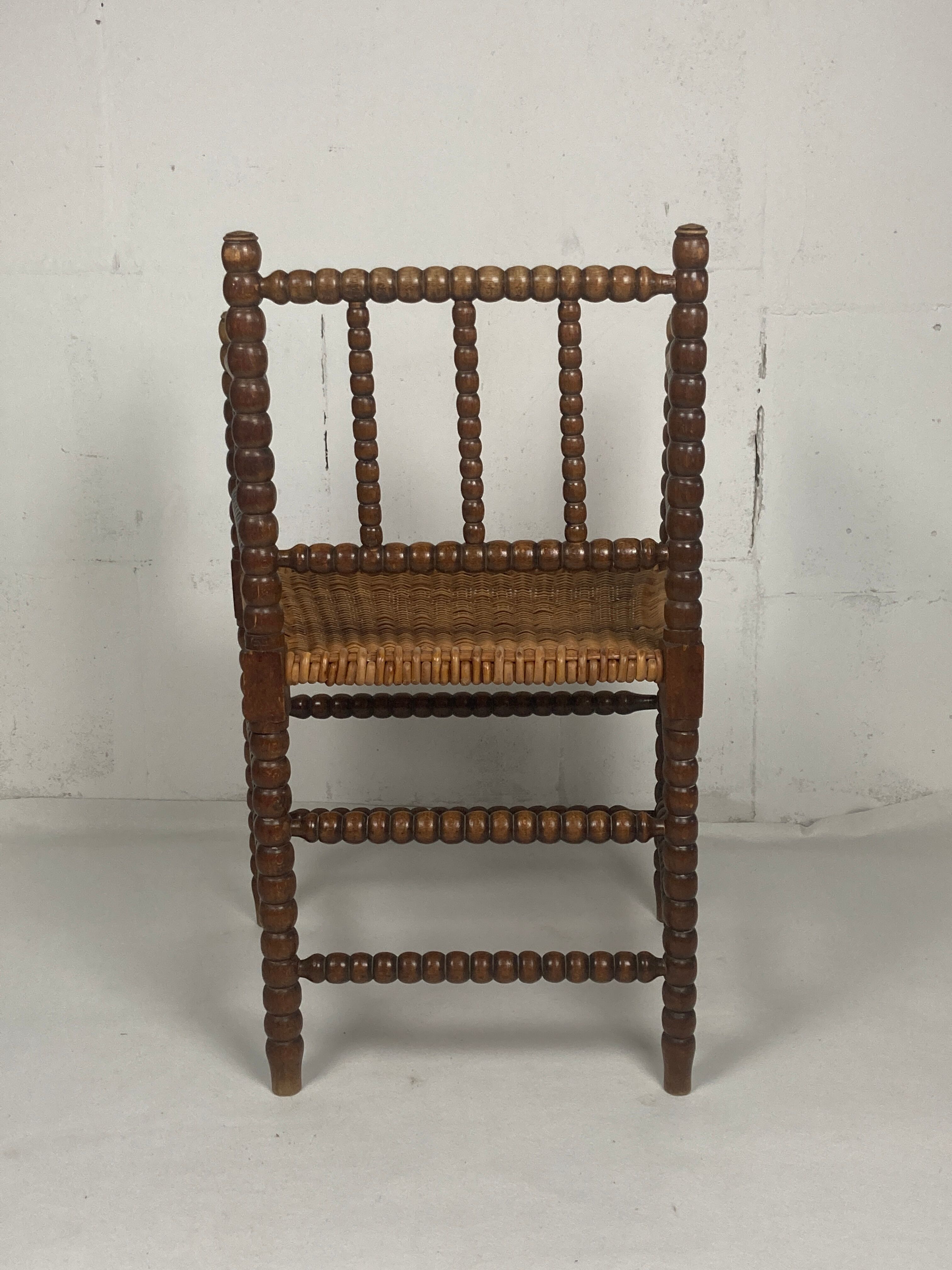 Fauteuil en osier et en bois tourné, années 1930 - 1950