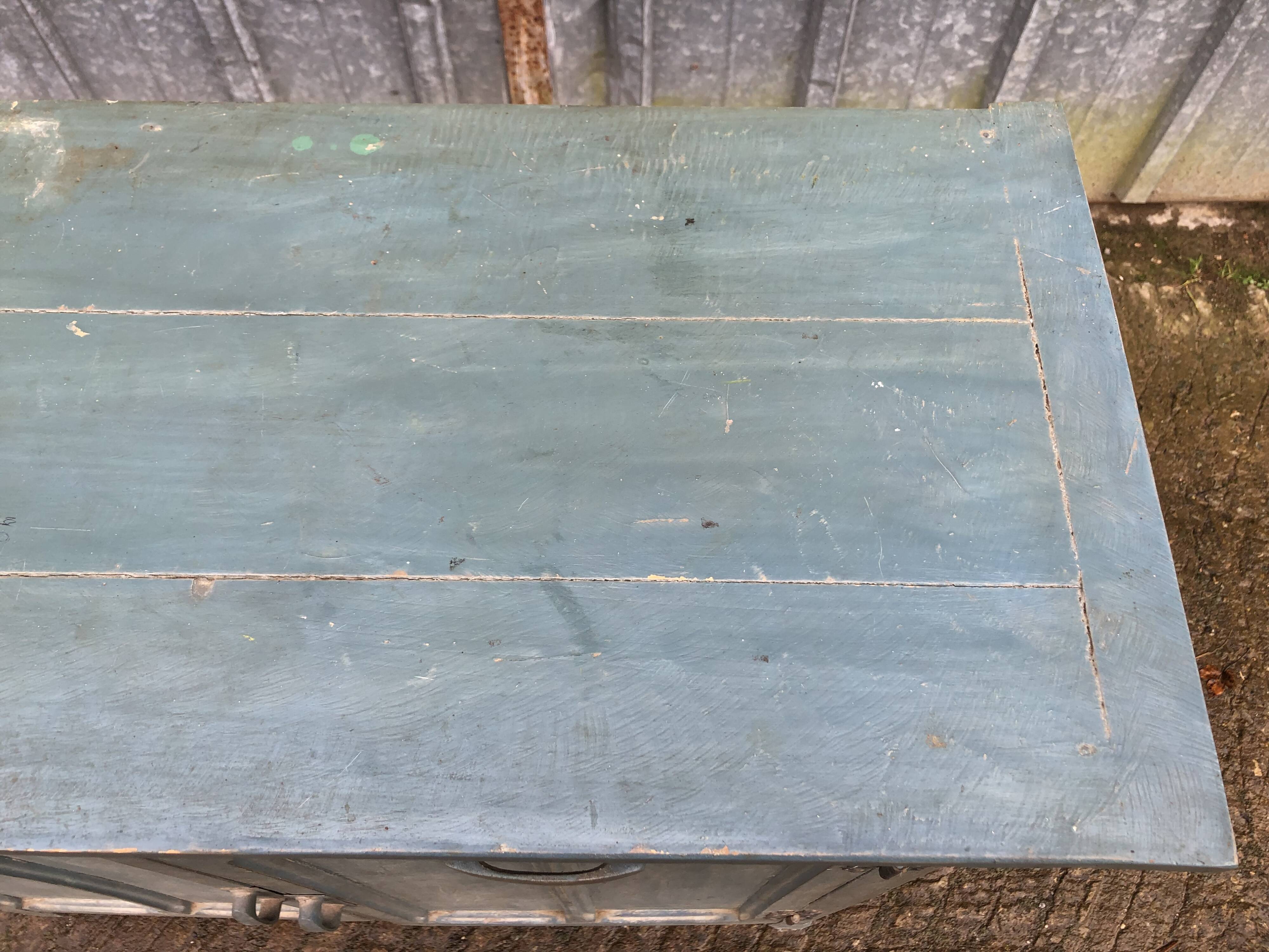 Parisian sideboard painted in blue with 2 doors and 2 drawers.