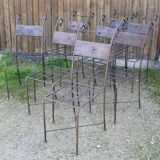 Series of 8 wrought iron garden chairs