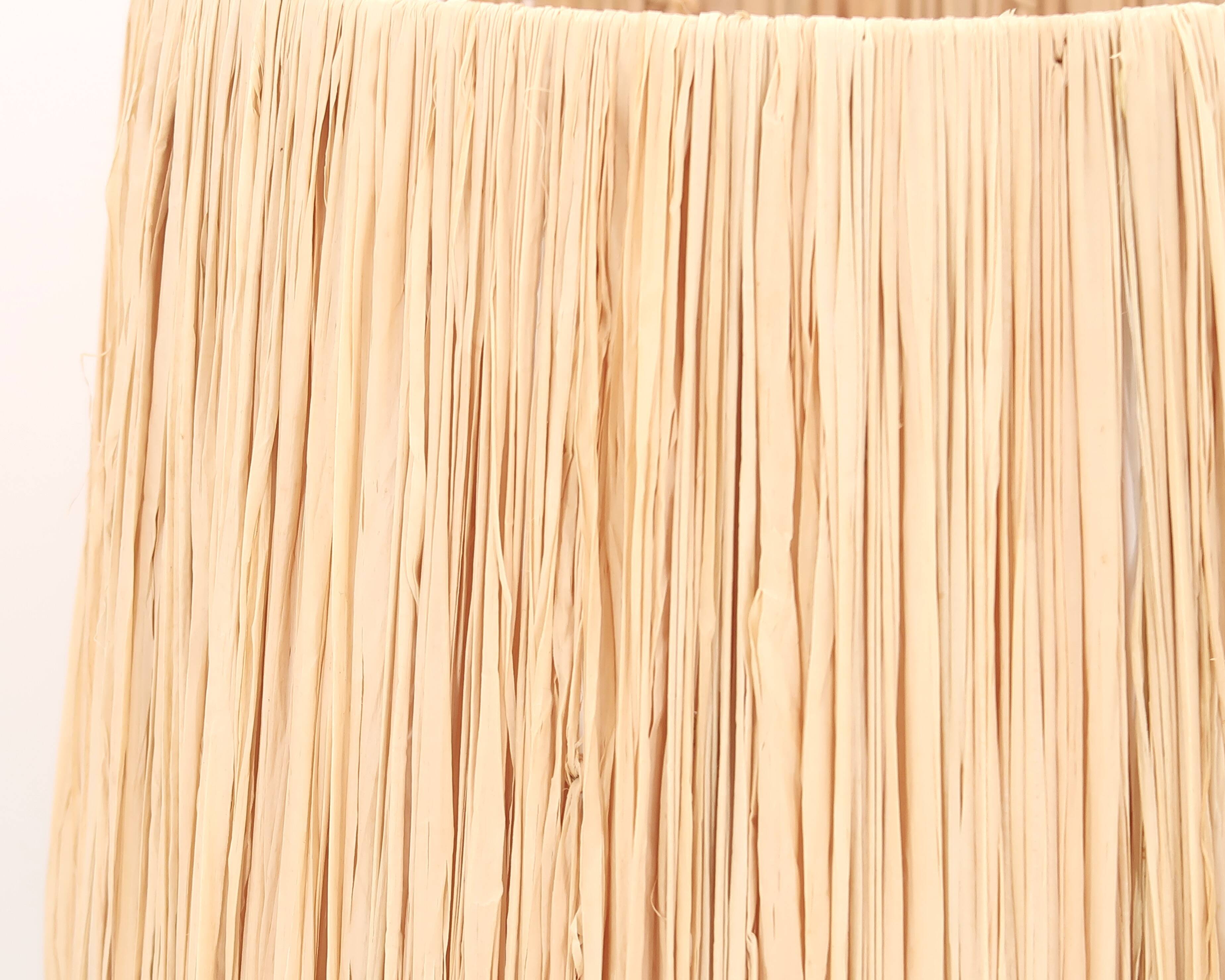 White ceramic lamp by Cari Zalloni, raffia lampshade