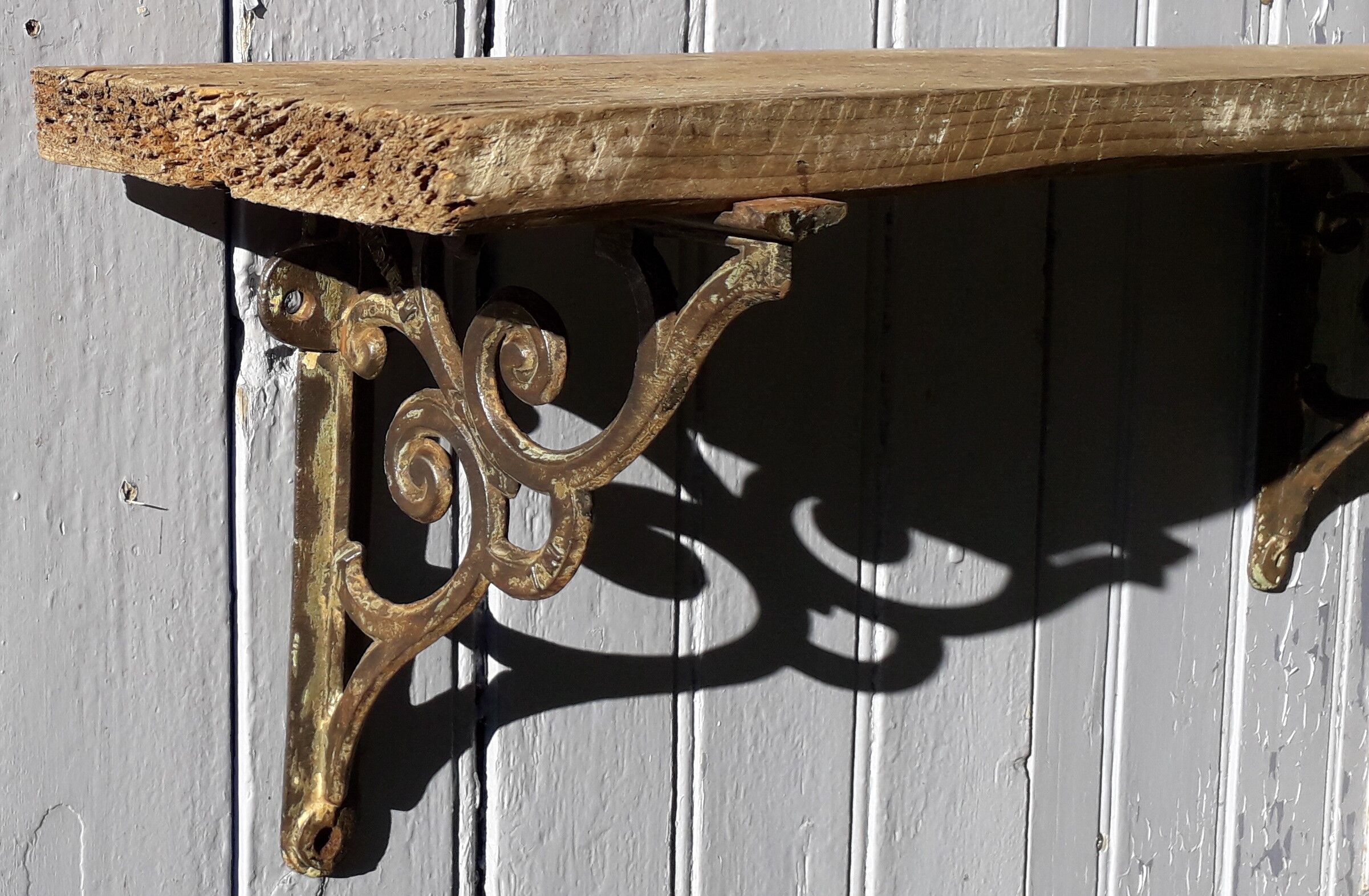 Wooden shelf and cast iron