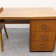 Modernist desk in blonde rosewood, France circa 1960.