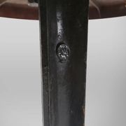 Cast Iron Bistro Table with Bakelite Top from Louis Vuitton, France, 1930s