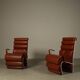 Pair of sculptural cognac leather armchairs, 1970s