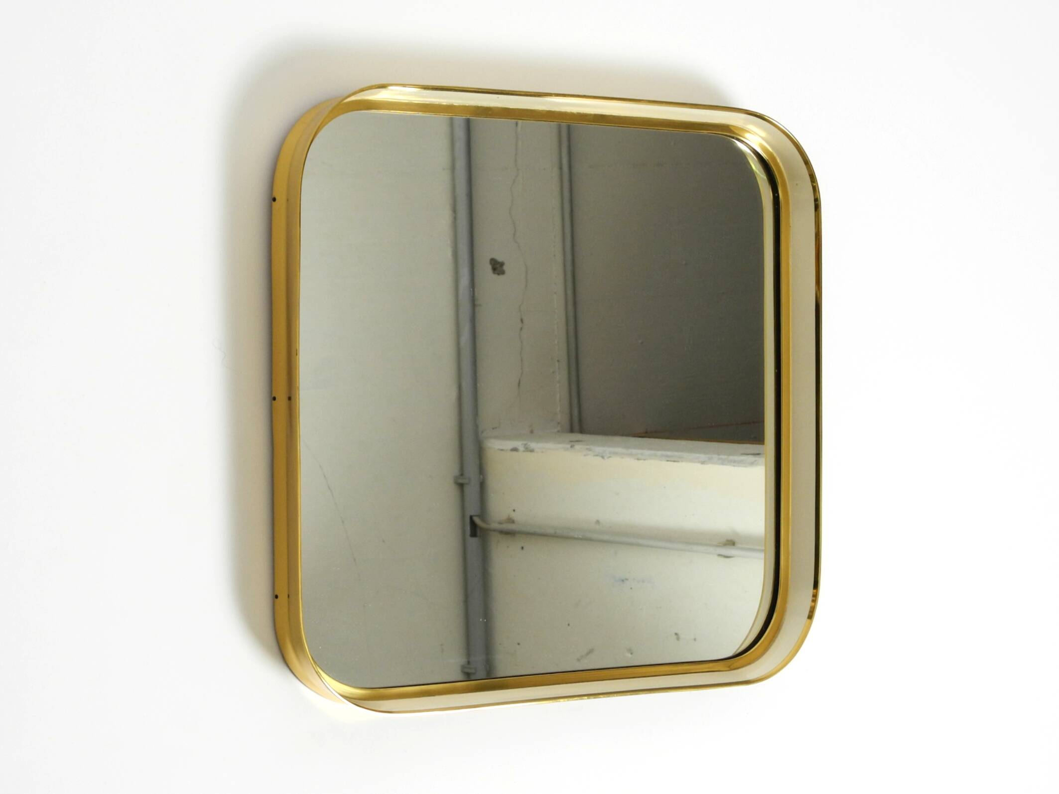 Beautiful original Mid Century Modern "Zier-Form" wall mirror with heavy br