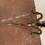 Floor lamp has three brass light arms