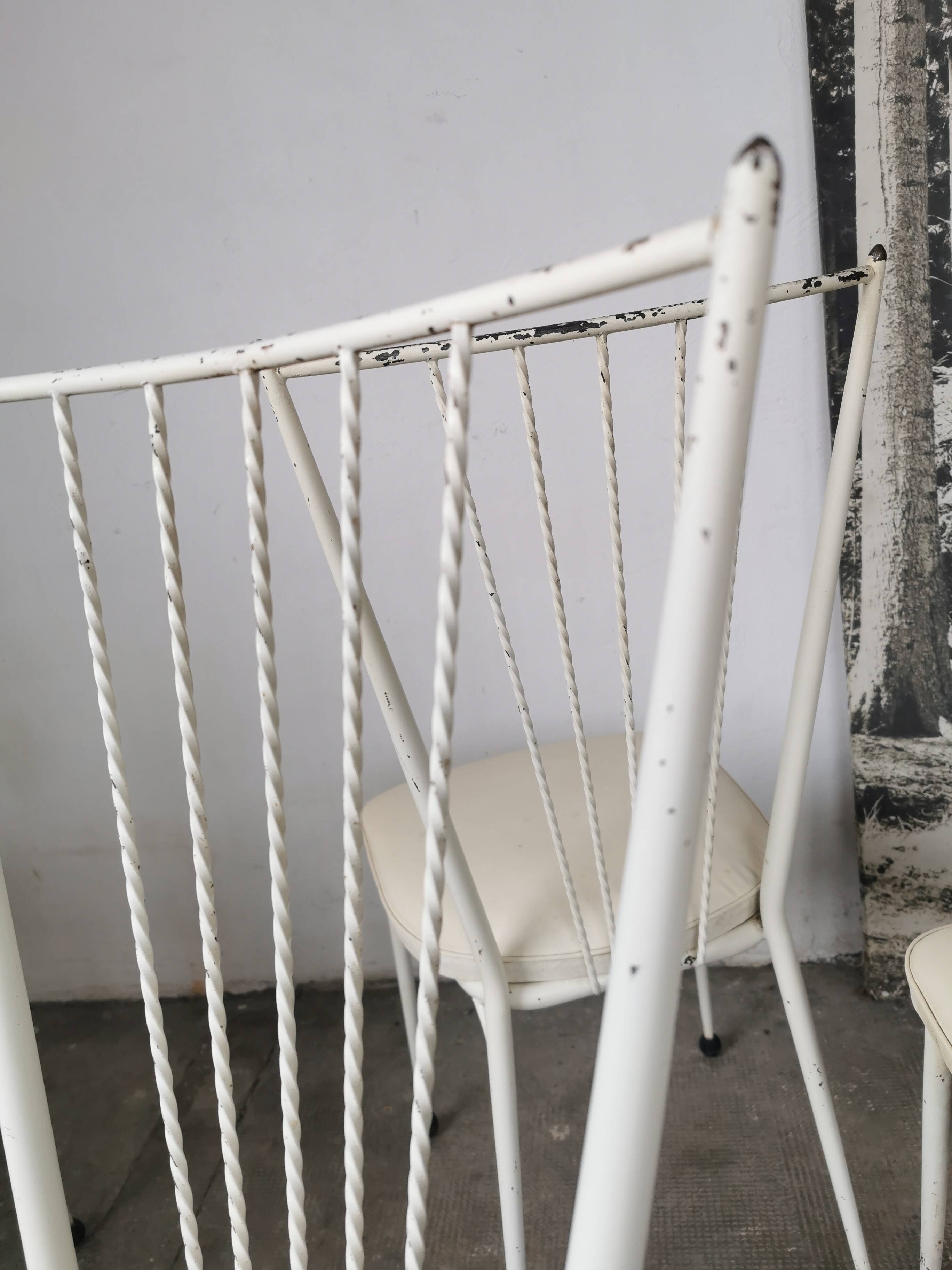 Set of 4 vintage chairs in metal and Skai