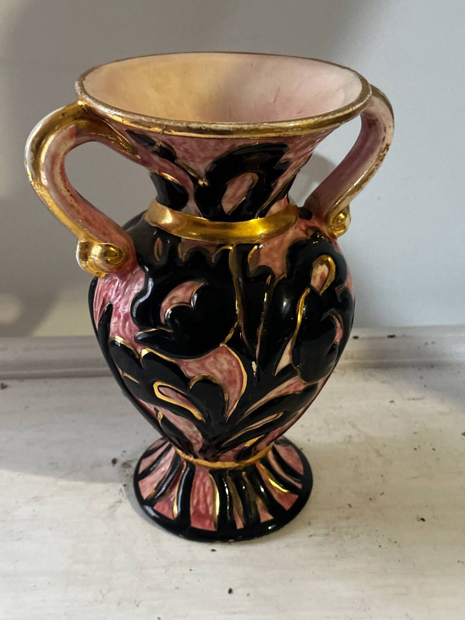 Vintage Vallauris vase amphora with relief floral decoration.