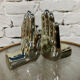 Pair of chrome ceramic hand bookends from the 70s and 80s