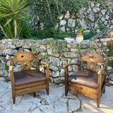Pair of armchairs in stained wood and leather, 20th century