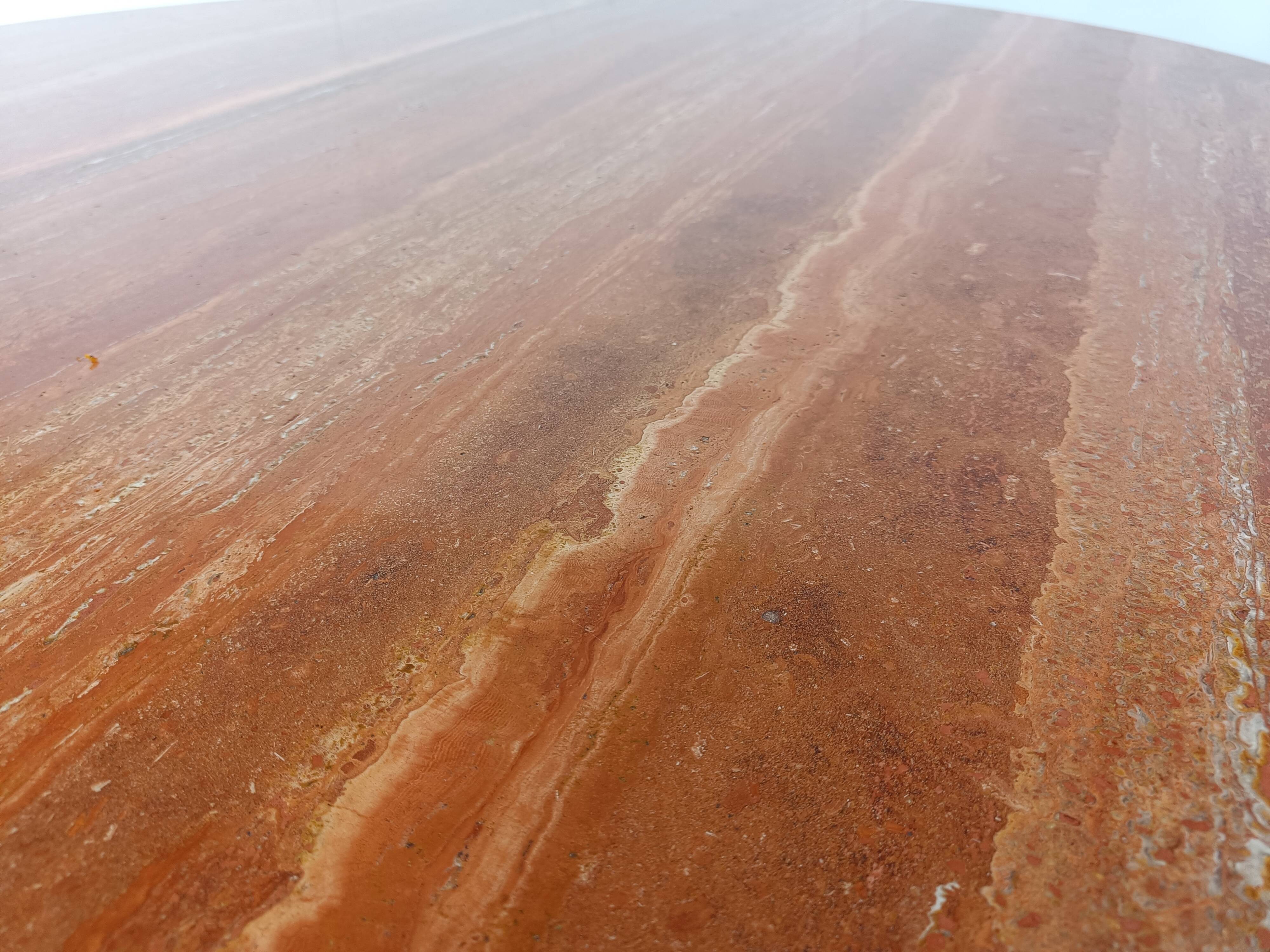 Large round red travertine dining table, 1970s