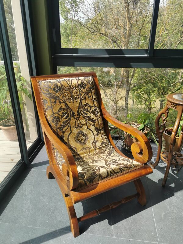 Fauteuil colonial en teck retapissé