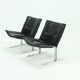 Set of 2 Danish lounge chairs by Kebe Møbler model Eagle with black leather.