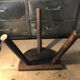 Wooden milking stool on tripod base