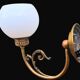 Pair of Napoleon III style brass and opaline wall lights