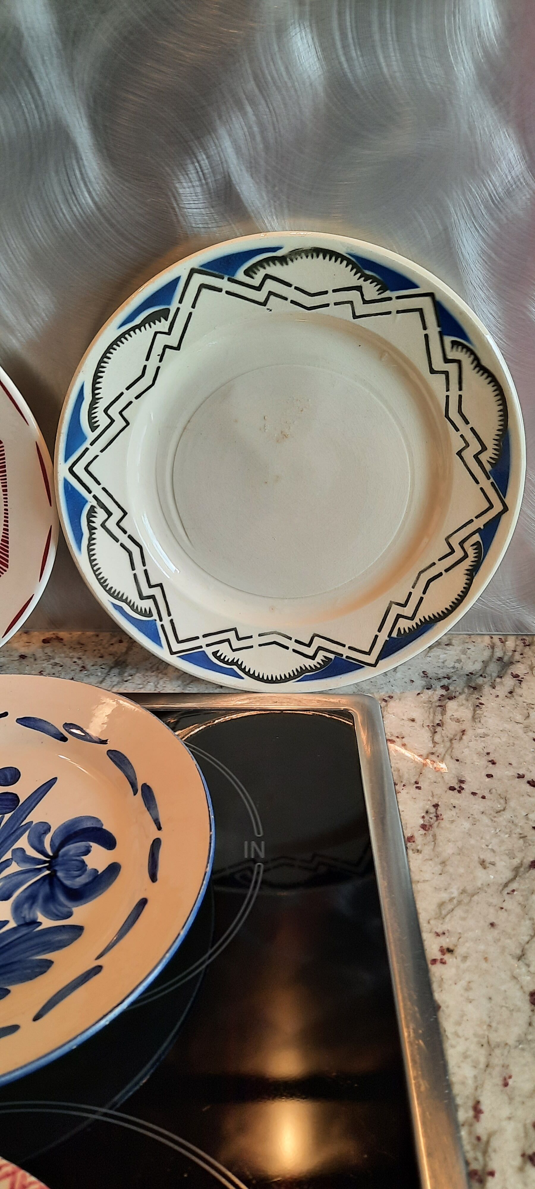 Old flat faience plates