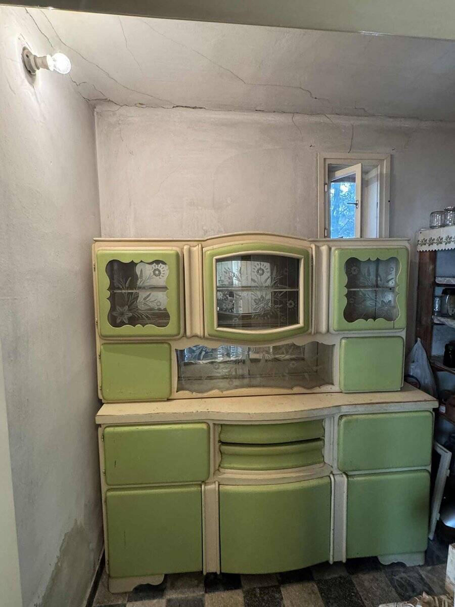 Hungarian Art Deco green and cream kitchen cabinet with glass doors, 1940s
