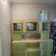 Hungarian Art Deco green and cream kitchen cabinet with glass doors, 1940s